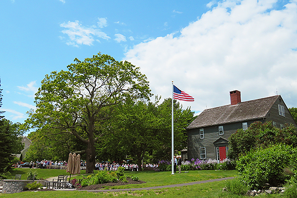 New donated flag in frot of Whipple Farmhouse.