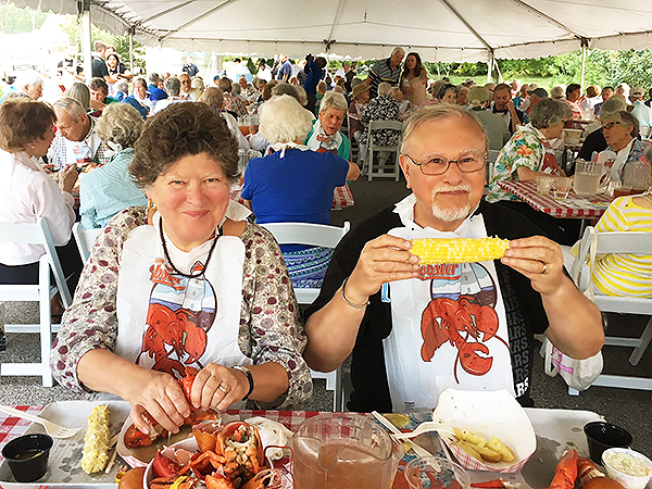 Residents Karen & David eating lobsters.