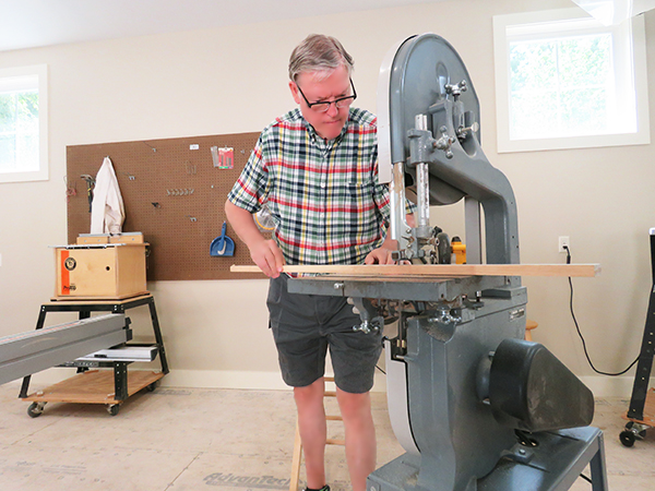 OceanView resident using scroll saw in new Workshop.