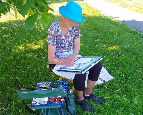 OceanView Resident Lee Painting Outside