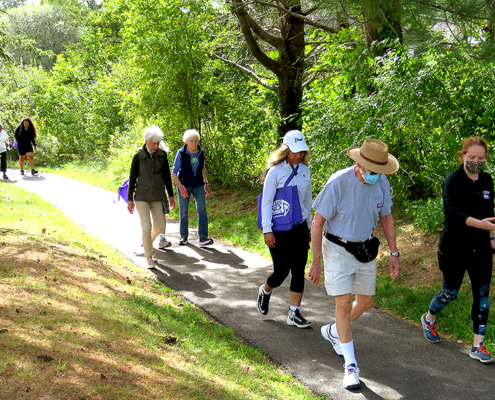 Residents and staff walking on OceanView's campus