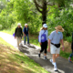 continuum of care retirement | Residents and staff walking on OceanView's campus